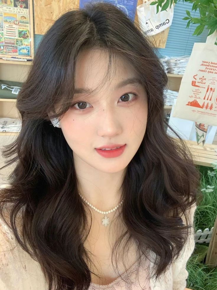 tóc uốn lơi hack tuổi